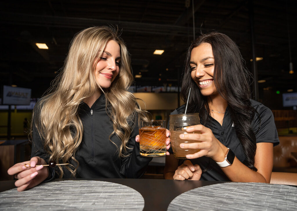 Girls enjoying drinks at happy hour